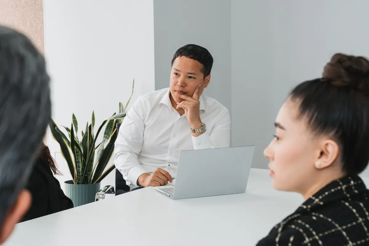 Visa Plan lawyer in consultation with clients