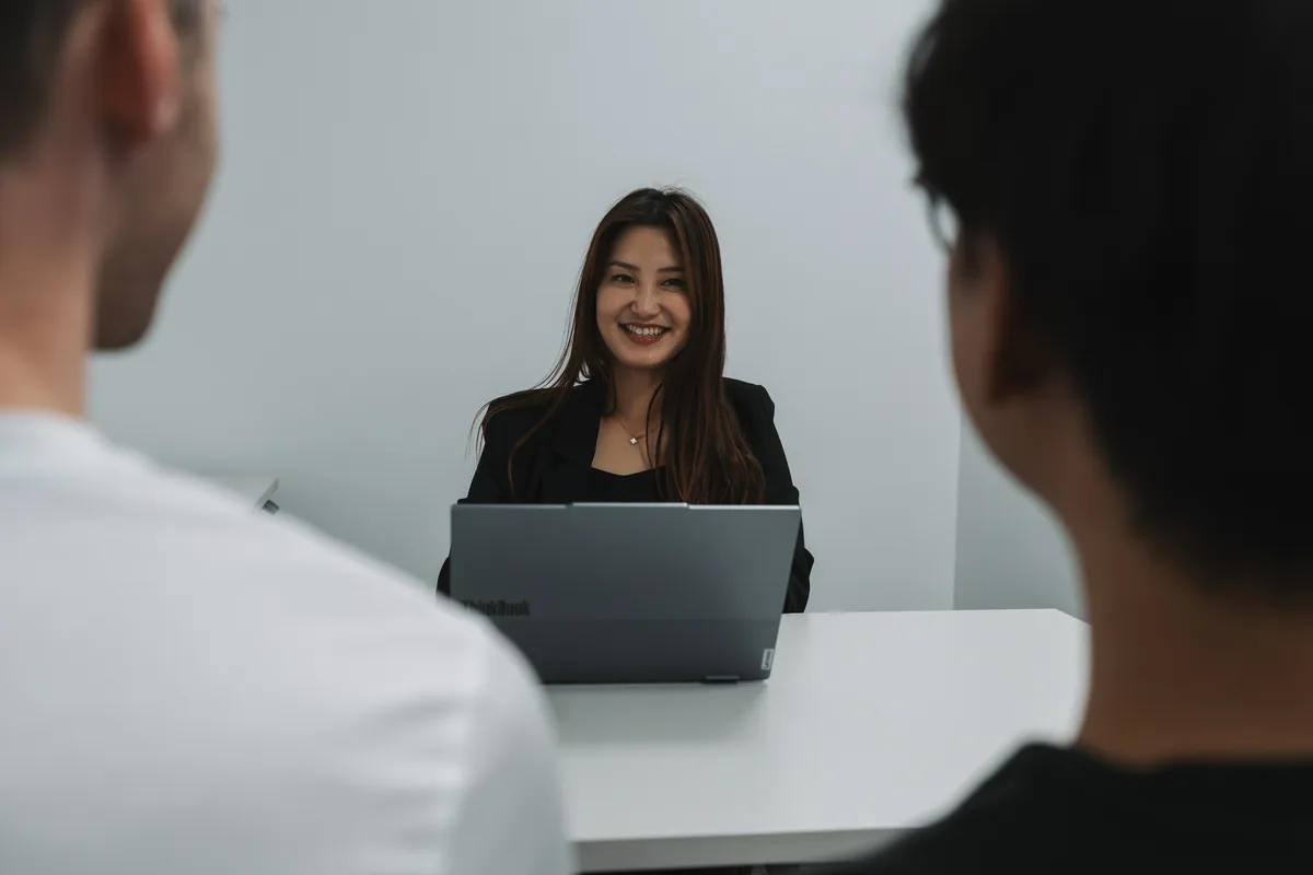 Visa Plan lawyer in consultation with clients